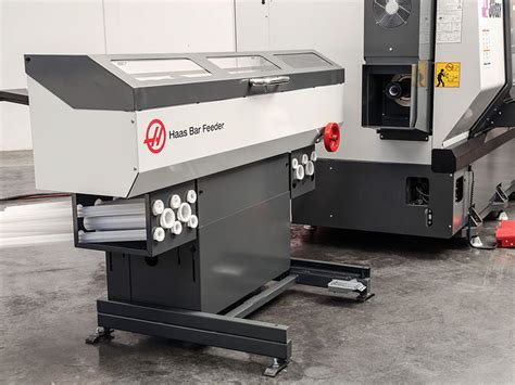 cnc lathe machine bar feeder|haas lathe feeder.